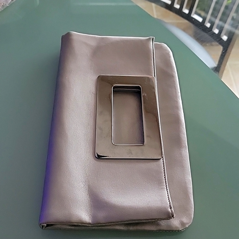 Redken 5th Ave. Silver clutch.